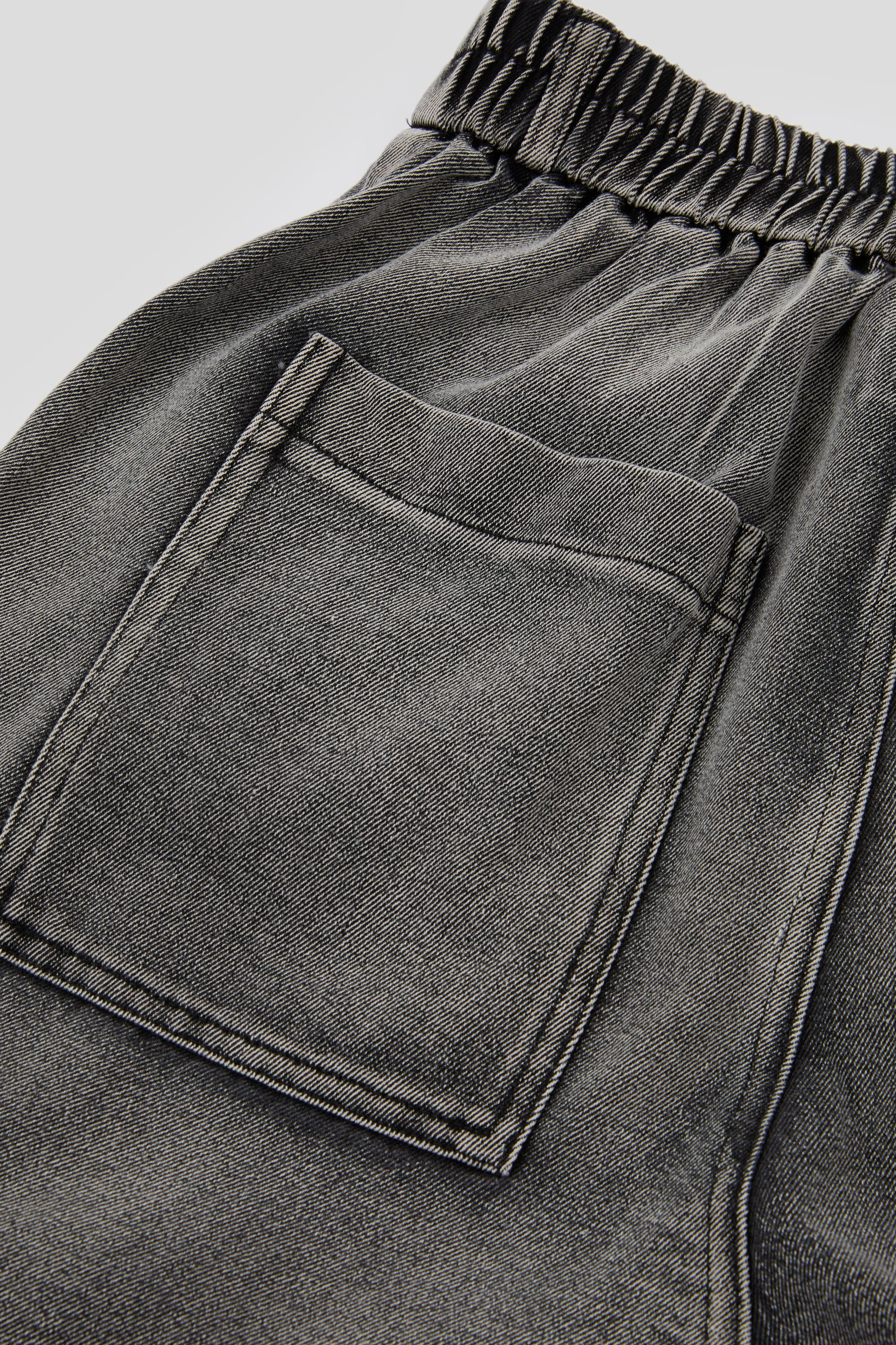 Charcoal Distressed Strap Denim Trousers