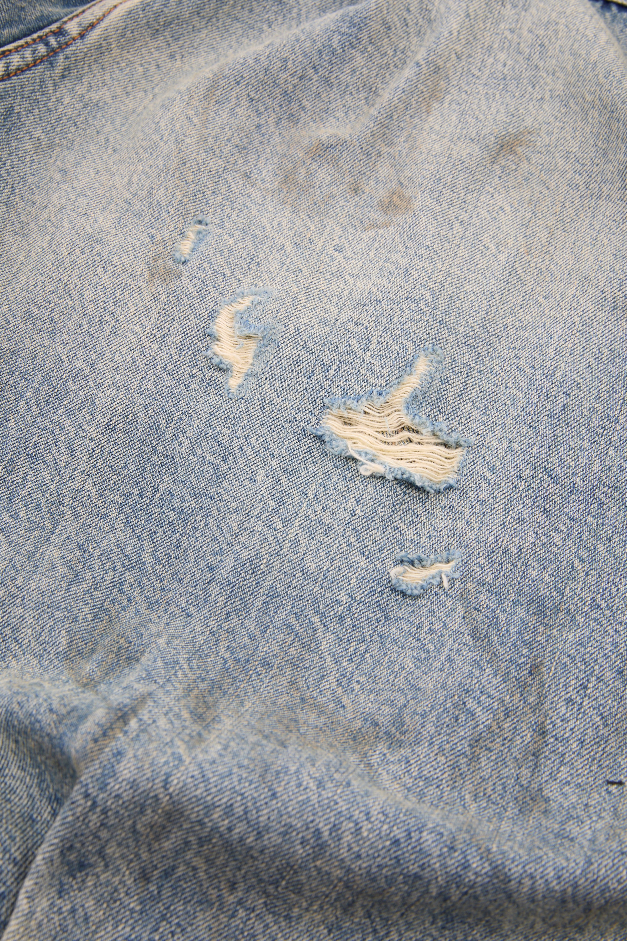 Distressed Indigo Denim Jacket