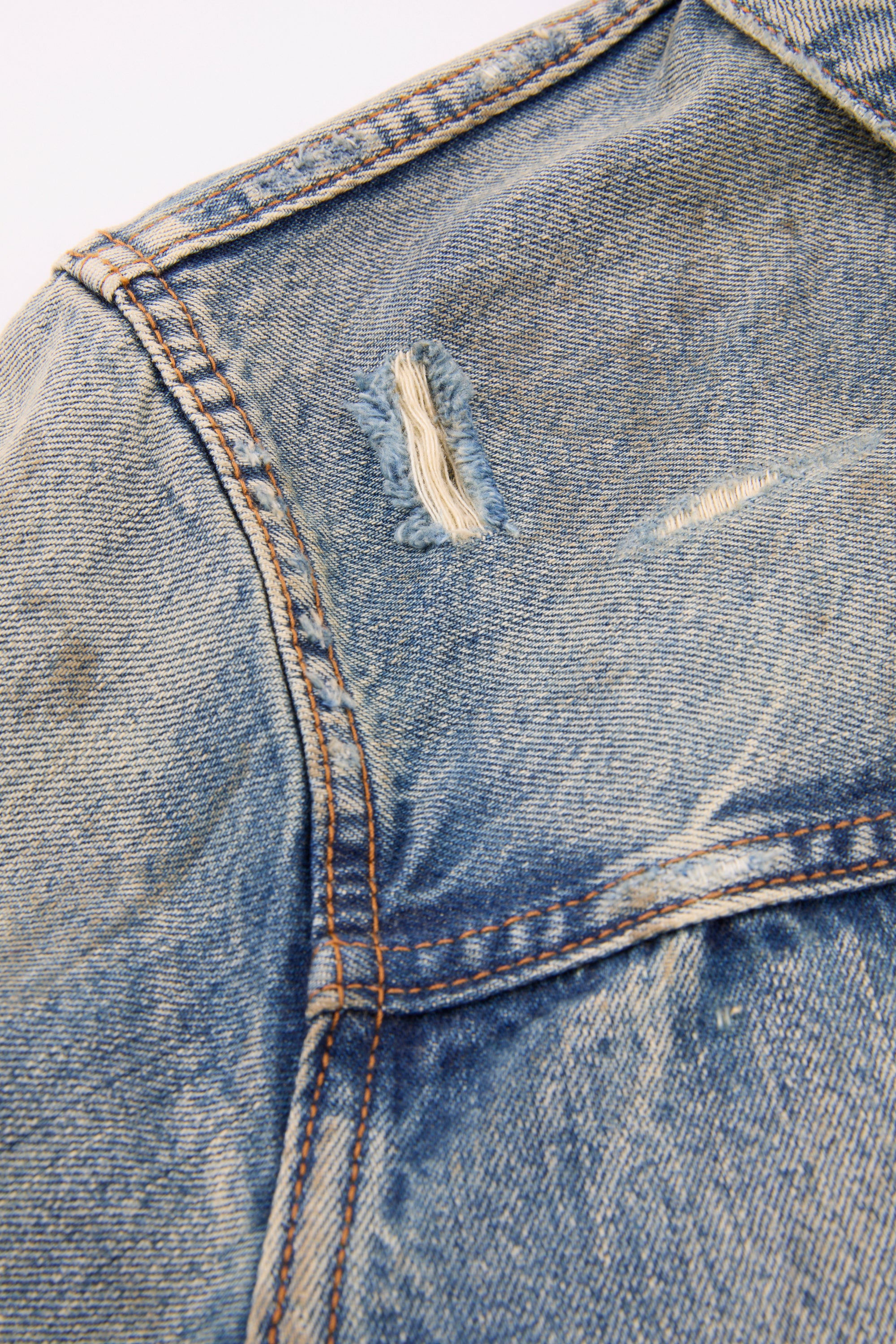 Distressed Indigo Denim Jacket