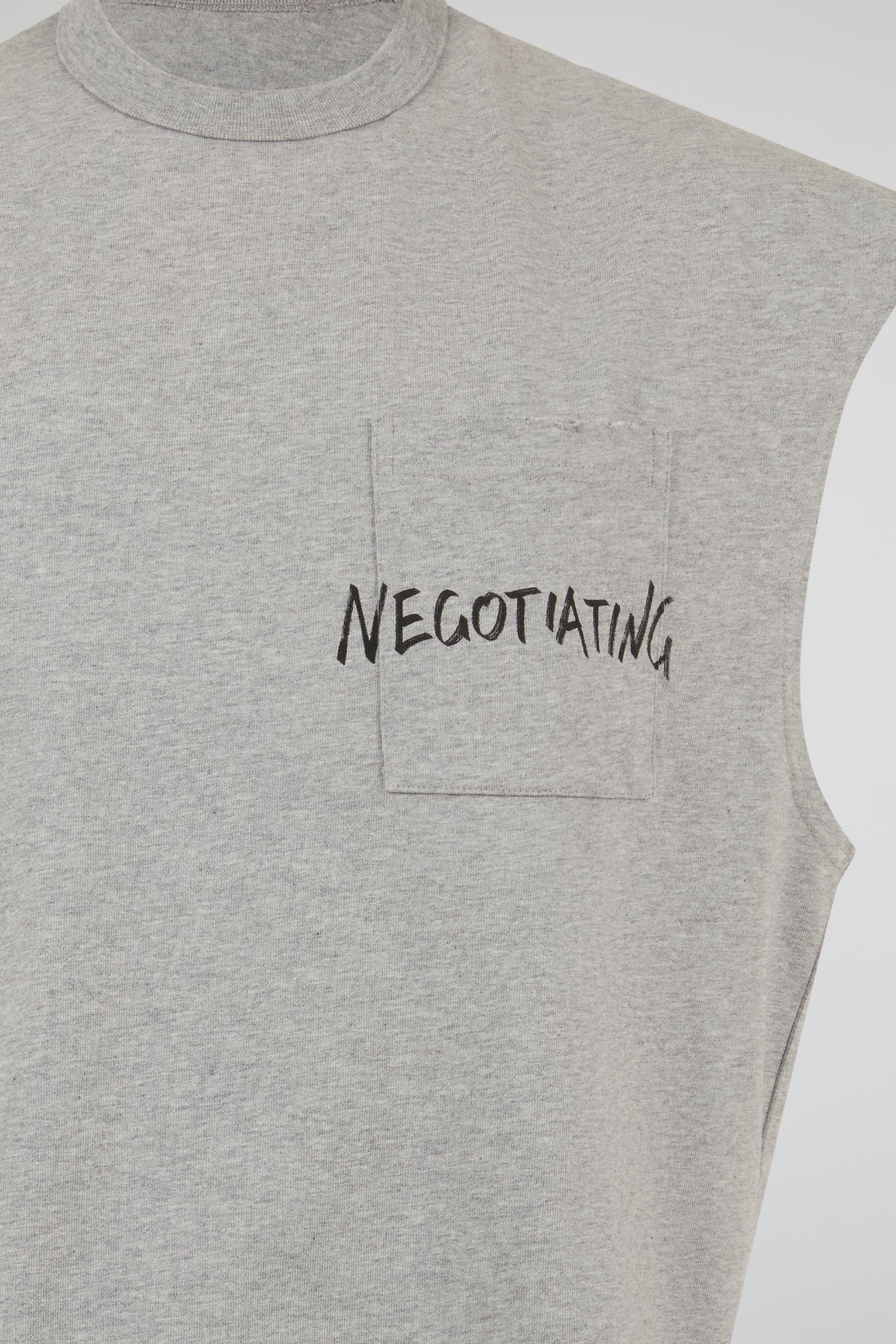 Negotiating Sleeveless Top