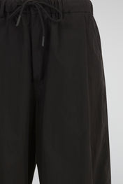 Matte Obsidian Black Minimalist Wide-Leg Trousers