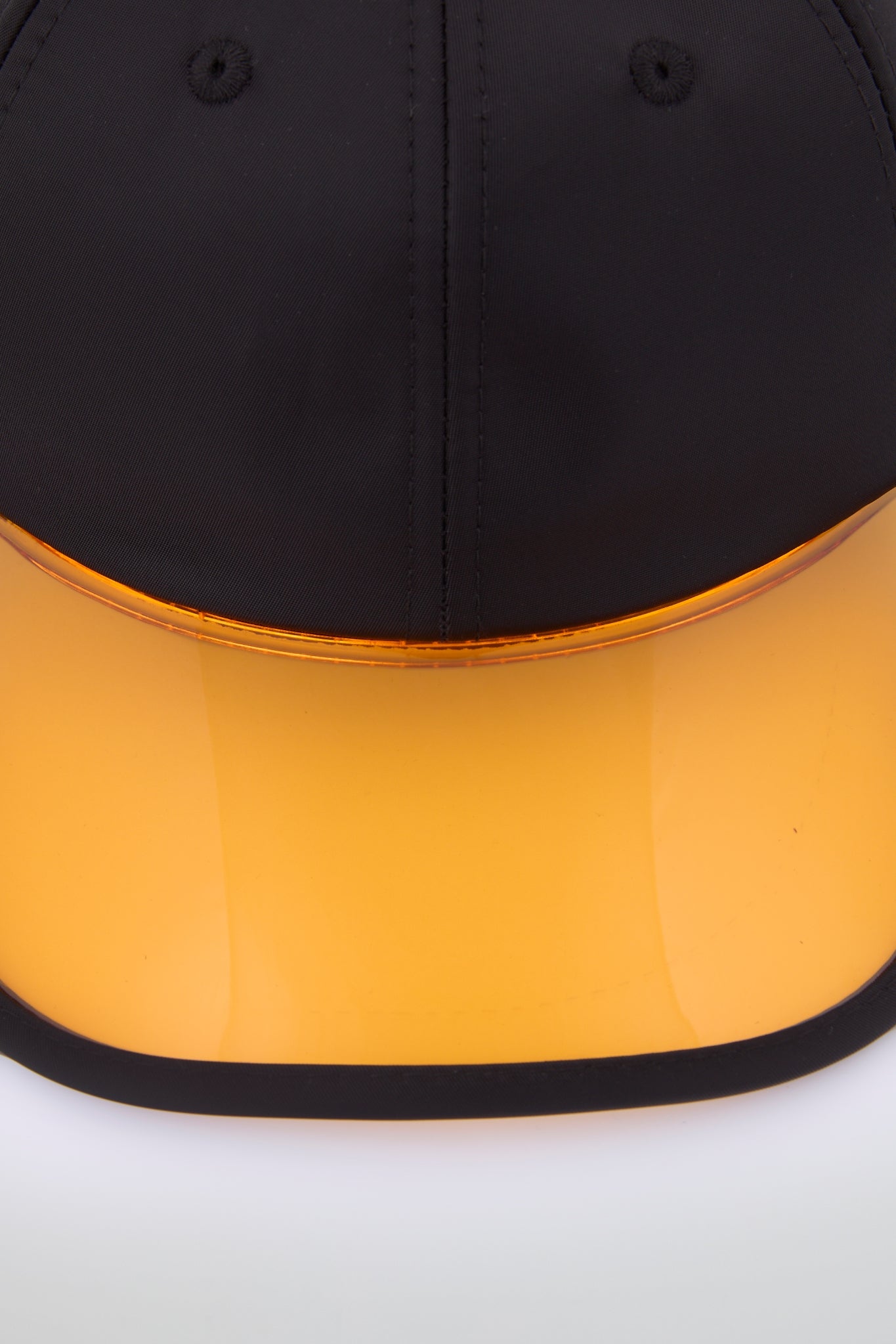Black baseball cap with orange pvc visor